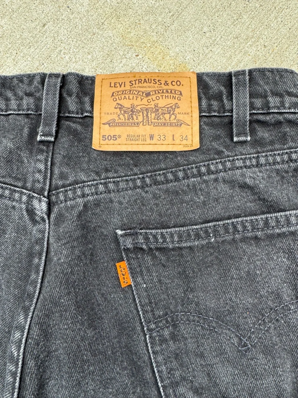 Vintage Levi’s 505 Faded Black Orange Tab Cutoff Shorts Size 33 90s